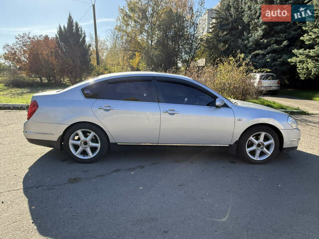 Сірий Ніссан Теана, об'ємом двигуна 3.5 л та пробігом 200 тис. км за 5500 $, фото 10 на Automoto.ua