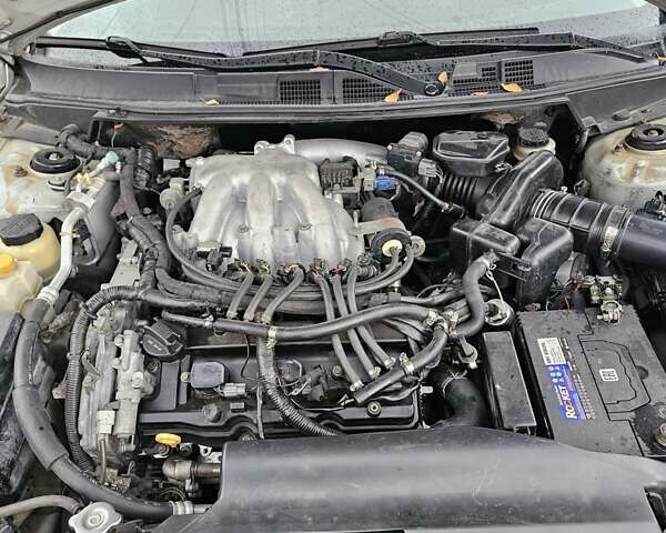 Ниссан Теана 2007 в Запорожье на Automoto.ua Серый Ниссан Теана, объемом двигателя 2.4 л и пробегом 220 тыс. км за 5000 $, фото 15 на Automoto.ua