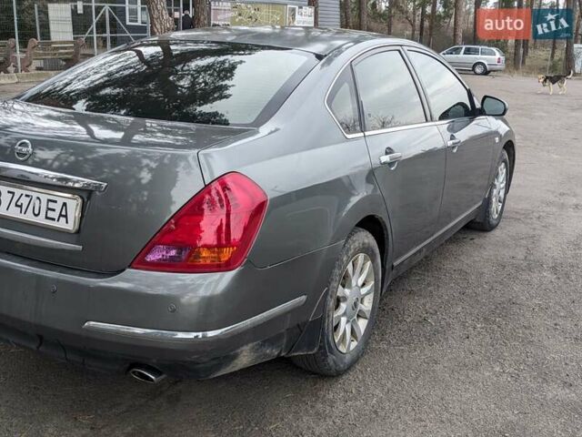 Серый Ниссан Теана, объемом двигателя 2.35 л и пробегом 300 тыс. км за 5000 $, фото 8 на Automoto.ua