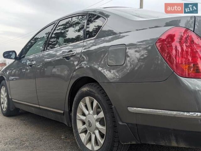 Серый Ниссан Теана, объемом двигателя 2.35 л и пробегом 300 тыс. км за 5000 $, фото 6 на Automoto.ua