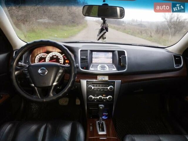 Серый Ниссан Теана, объемом двигателя 2.5 л и пробегом 178 тыс. км за 8700 $, фото 4 на Automoto.ua