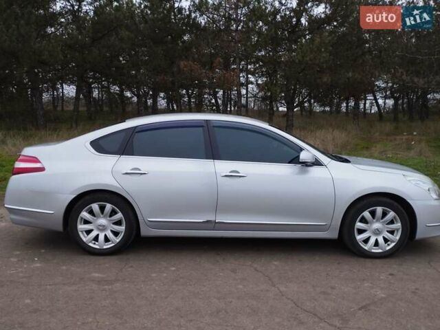 Серый Ниссан Теана, объемом двигателя 2.5 л и пробегом 178 тыс. км за 8700 $, фото 2 на Automoto.ua