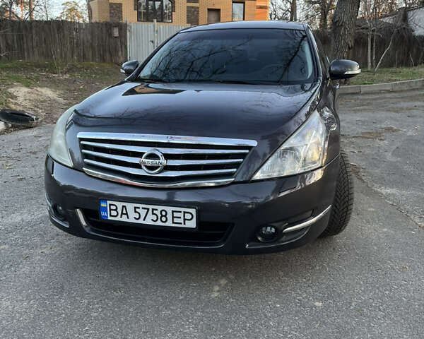 Серый Ниссан Теана, объемом двигателя 2.5 л и пробегом 208 тыс. км за 7000 $, фото 1 на Automoto.ua