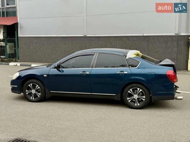 Синий Ниссан Теана, объемом двигателя 2.35 л и пробегом 280 тыс. км за 3300 $, фото 7 на Automoto.ua