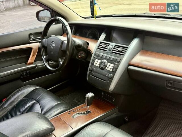 Синий Ниссан Теана, объемом двигателя 2.35 л и пробегом 280 тыс. км за 3300 $, фото 15 на Automoto.ua