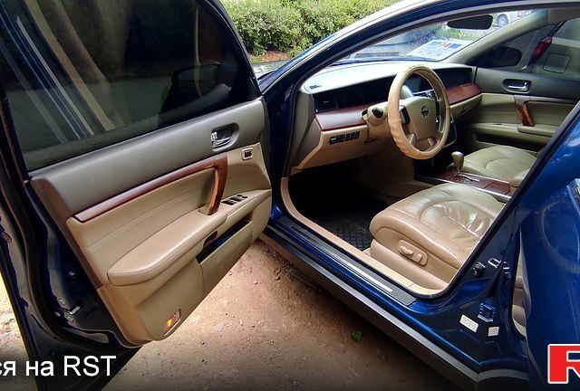 Синий Ниссан Теана, объемом двигателя 2.3 л и пробегом 221 тыс. км за 5500 $, фото 5 на Automoto.ua