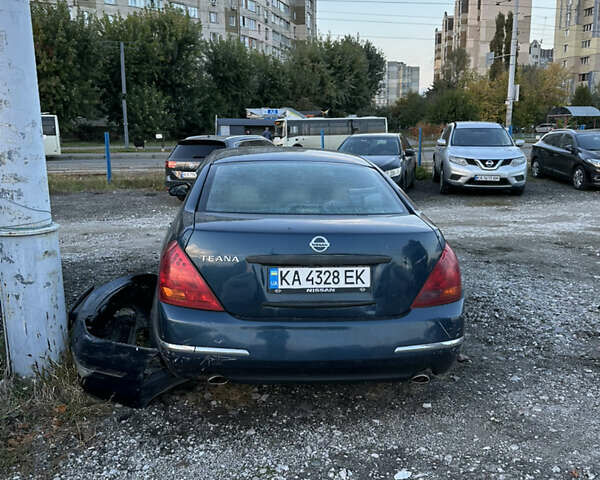 Синий Ниссан Теана, объемом двигателя 2.3 л и пробегом 228 тыс. км за 2900 $, фото 4 на Automoto.ua