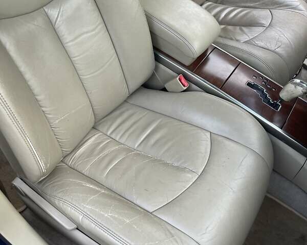 Синий Ниссан Теана, объемом двигателя 2.3 л и пробегом 250 тыс. км за 5700 $, фото 17 на Automoto.ua