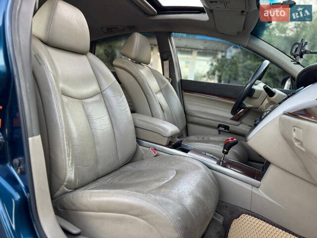 Синий Ниссан Теана, объемом двигателя 2.3 л и пробегом 228 тыс. км за 2900 $, фото 12 на Automoto.ua