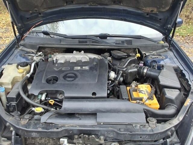 Синий Ниссан Теана, объемом двигателя 3.5 л и пробегом 205 тыс. км за 5000 $, фото 10 на Automoto.ua