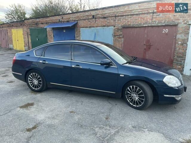 Синий Ниссан Теана, объемом двигателя 2.3 л и пробегом 250 тыс. км за 5700 $, фото 2 на Automoto.ua