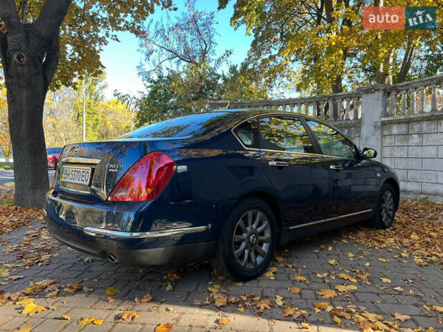 Синій Ніссан Теана, об'ємом двигуна 2.3 л та пробігом 231 тис. км за 4999 $, фото 8 на Automoto.ua