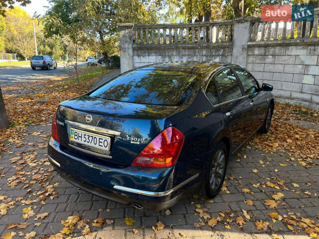 Синій Ніссан Теана, об'ємом двигуна 2.3 л та пробігом 231 тис. км за 4999 $, фото 4 на Automoto.ua