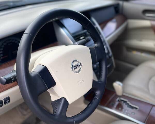 Синий Ниссан Теана, объемом двигателя 2.3 л и пробегом 250 тыс. км за 5700 $, фото 12 на Automoto.ua