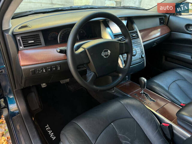 Синій Ніссан Теана, об'ємом двигуна 2.3 л та пробігом 231 тис. км за 4999 $, фото 21 на Automoto.ua