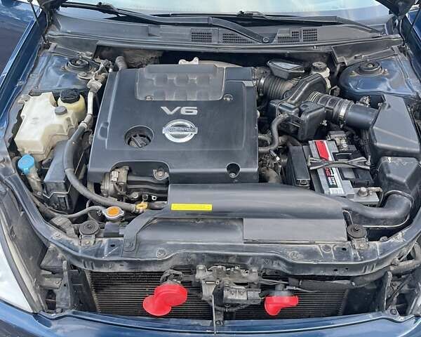 Синий Ниссан Теана, объемом двигателя 2.3 л и пробегом 250 тыс. км за 5700 $, фото 10 на Automoto.ua