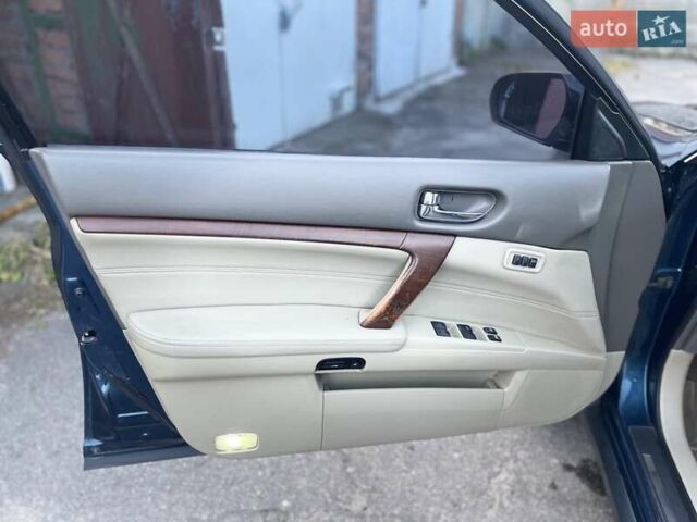 Синий Ниссан Теана, объемом двигателя 2.3 л и пробегом 250 тыс. км за 5700 $, фото 20 на Automoto.ua