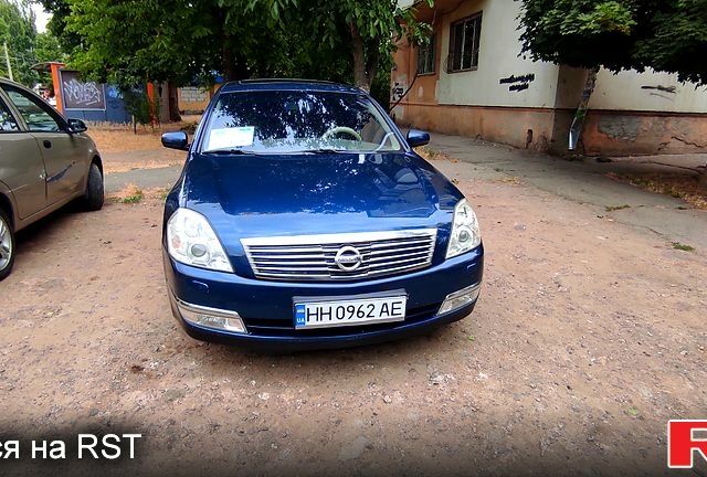 Синий Ниссан Теана, объемом двигателя 2.3 л и пробегом 221 тыс. км за 5500 $, фото 9 на Automoto.ua