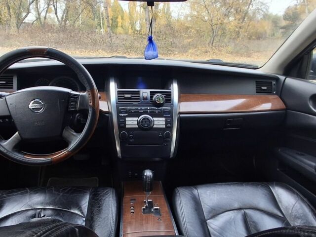 Синий Ниссан Теана, объемом двигателя 3.5 л и пробегом 205 тыс. км за 5000 $, фото 5 на Automoto.ua