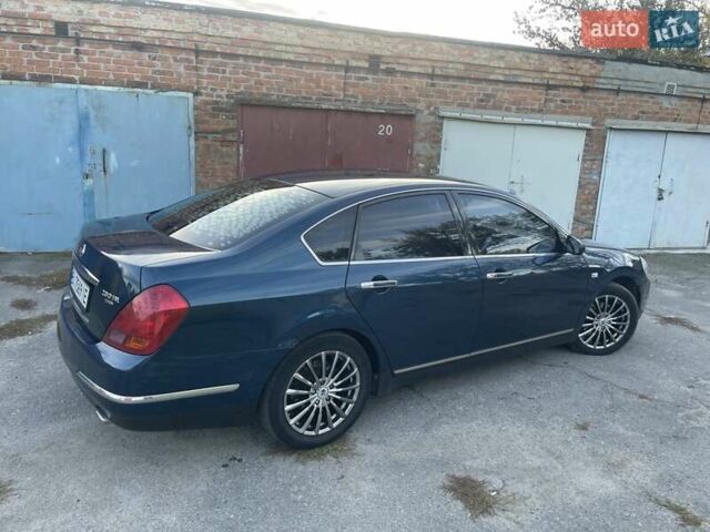 Синий Ниссан Теана, объемом двигателя 2.3 л и пробегом 250 тыс. км за 5700 $, фото 3 на Automoto.ua