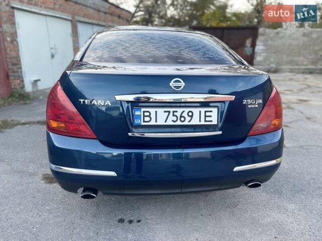 Синий Ниссан Теана, объемом двигателя 2.3 л и пробегом 250 тыс. км за 5700 $, фото 5 на Automoto.ua