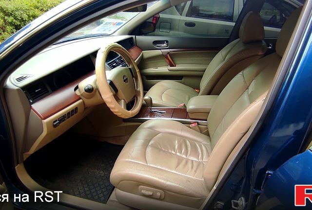 Синий Ниссан Теана, объемом двигателя 2.3 л и пробегом 221 тыс. км за 5500 $, фото 4 на Automoto.ua