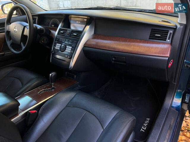 Синій Ніссан Теана, об'ємом двигуна 2.3 л та пробігом 231 тис. км за 4999 $, фото 27 на Automoto.ua