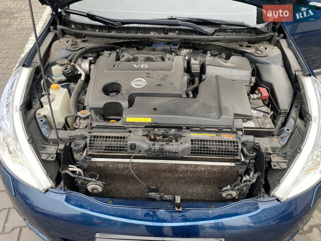 Синий Ниссан Теана, объемом двигателя 2.5 л и пробегом 275 тыс. км за 6500 $, фото 24 на Automoto.ua