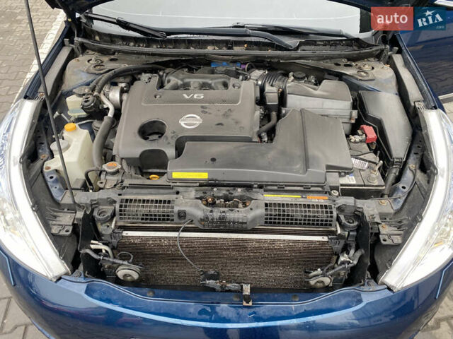 Синий Ниссан Теана, объемом двигателя 2.5 л и пробегом 275 тыс. км за 6500 $, фото 23 на Automoto.ua
