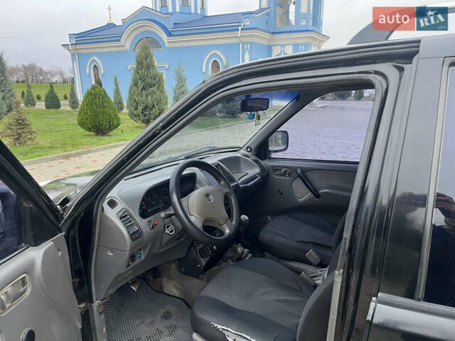 Чорний Ніссан Террано, об'ємом двигуна 2.39 л та пробігом 520 тис. км за 4400 $, фото 6 на Automoto.ua