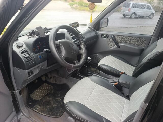 Черный Ниссан Террано, объемом двигателя 2.7 л и пробегом 270 тыс. км за 3500 $, фото 7 на Automoto.ua