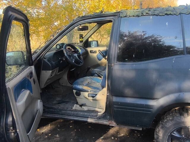 Черный Ниссан Террано, объемом двигателя 2.7 л и пробегом 100 тыс. км за 835 $, фото 2 на Automoto.ua