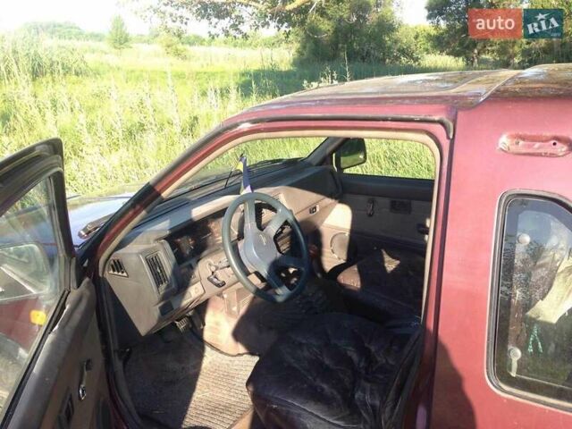 Червоний Ніссан Террано, об'ємом двигуна 2.4 л та пробігом 272 тис. км за 4900 $, фото 5 на Automoto.ua
