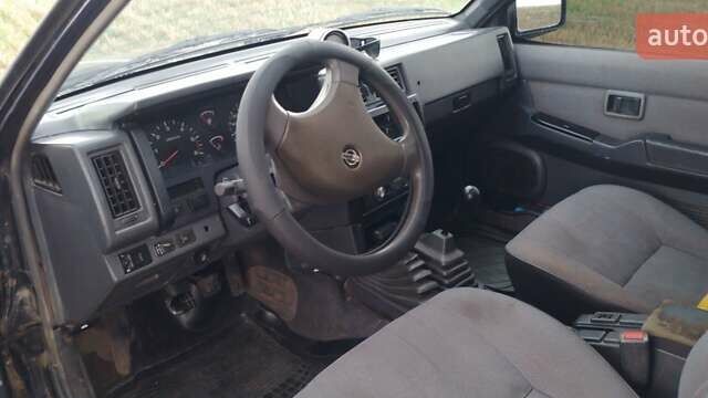 Синий Ниссан Террано, объемом двигателя 2.37 л и пробегом 360 тыс. км за 4500 $, фото 11 на Automoto.ua