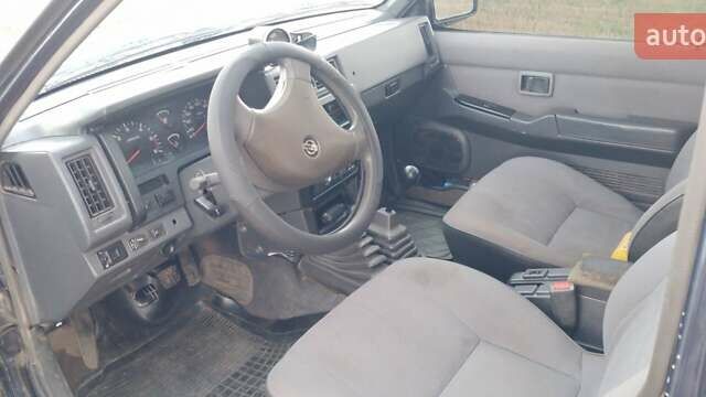 Синий Ниссан Террано, объемом двигателя 2.37 л и пробегом 360 тыс. км за 4500 $, фото 10 на Automoto.ua