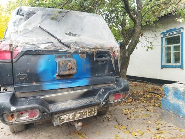 Синій Ніссан Террано, об'ємом двигуна 2.4 л та пробігом 250 тис. км за 834 $, фото 8 на Automoto.ua