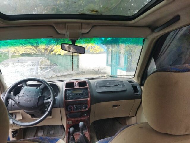 Синій Ніссан Террано, об'ємом двигуна 2.4 л та пробігом 250 тис. км за 834 $, фото 2 на Automoto.ua