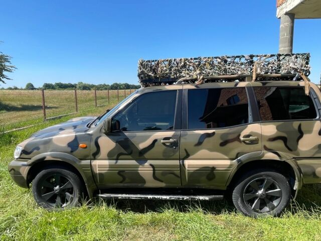 Синий Ниссан Террано, объемом двигателя 3 л и пробегом 276 тыс. км за 4500 $, фото 2 на Automoto.ua