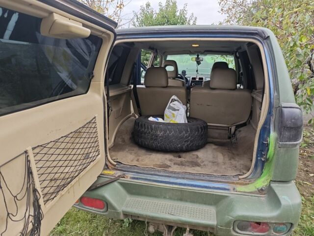 Зелений Ніссан Террано, об'ємом двигуна 3 л та пробігом 400 тис. км за 3117 $, фото 2 на Automoto.ua