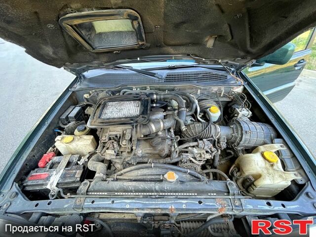 Зеленый Ниссан Террано, объемом двигателя 3 л и пробегом 316 тыс. км за 3000 $, фото 8 на Automoto.ua