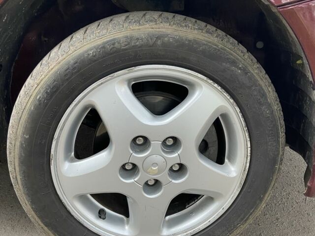 Червоний Ніссан Тіно, об'ємом двигуна 1.8 л та пробігом 226 тис. км за 3400 $, фото 11 на Automoto.ua