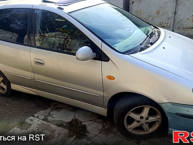 Серый Ниссан Тино, объемом двигателя 2 л и пробегом 315 тыс. км за 1100 $, фото 12 на Automoto.ua