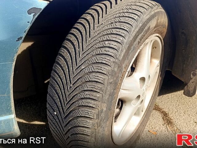 Серый Ниссан Тино, объемом двигателя 2 л и пробегом 315 тыс. км за 1100 $, фото 6 на Automoto.ua