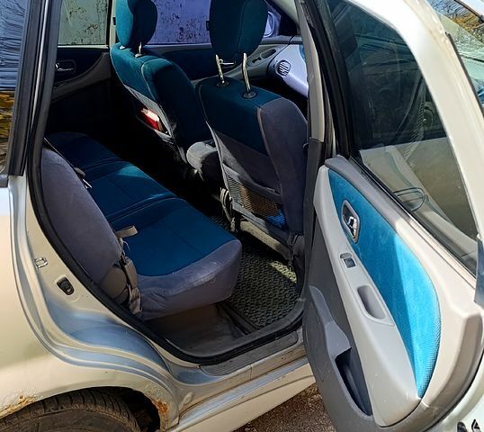 Серый Ниссан Тино, объемом двигателя 2 л и пробегом 315 тыс. км за 1100 $, фото 4 на Automoto.ua