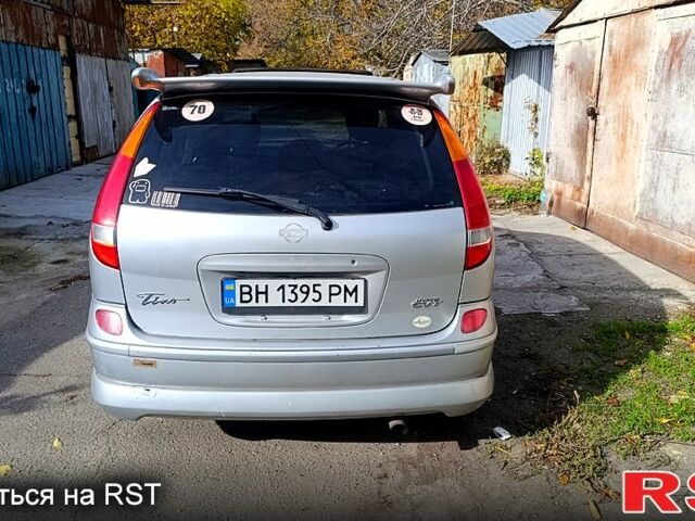 Серый Ниссан Тино, объемом двигателя 2 л и пробегом 315 тыс. км за 1100 $, фото 10 на Automoto.ua