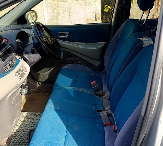 Серый Ниссан Тино, объемом двигателя 2 л и пробегом 315 тыс. км за 1100 $, фото 7 на Automoto.ua