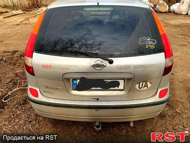 Серый Ниссан Тино, объемом двигателя 18 л и пробегом 300 тыс. км за 3200 $, фото 2 на Automoto.ua