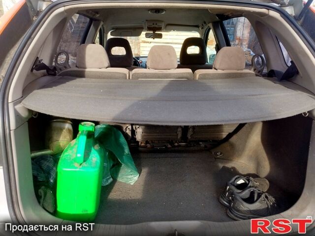 Серый Ниссан Тино, объемом двигателя 18 л и пробегом 300 тыс. км за 3200 $, фото 6 на Automoto.ua