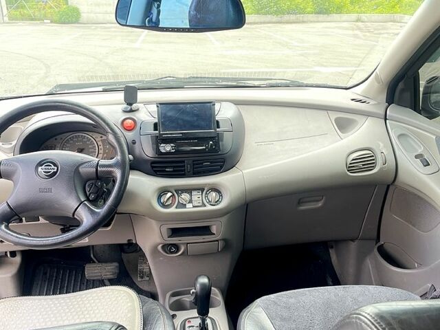 Серый Ниссан Тино, объемом двигателя 2 л и пробегом 225 тыс. км за 2500 $, фото 5 на Automoto.ua