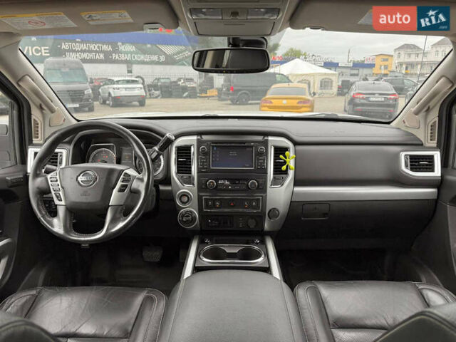 Белый Ниссан Титан, объемом двигателя 4.98 л и пробегом 330 тыс. км за 30000 $, фото 7 на Automoto.ua